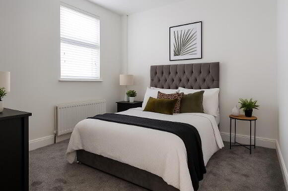 Neutral Harmony in Daylight Bedroom.png
