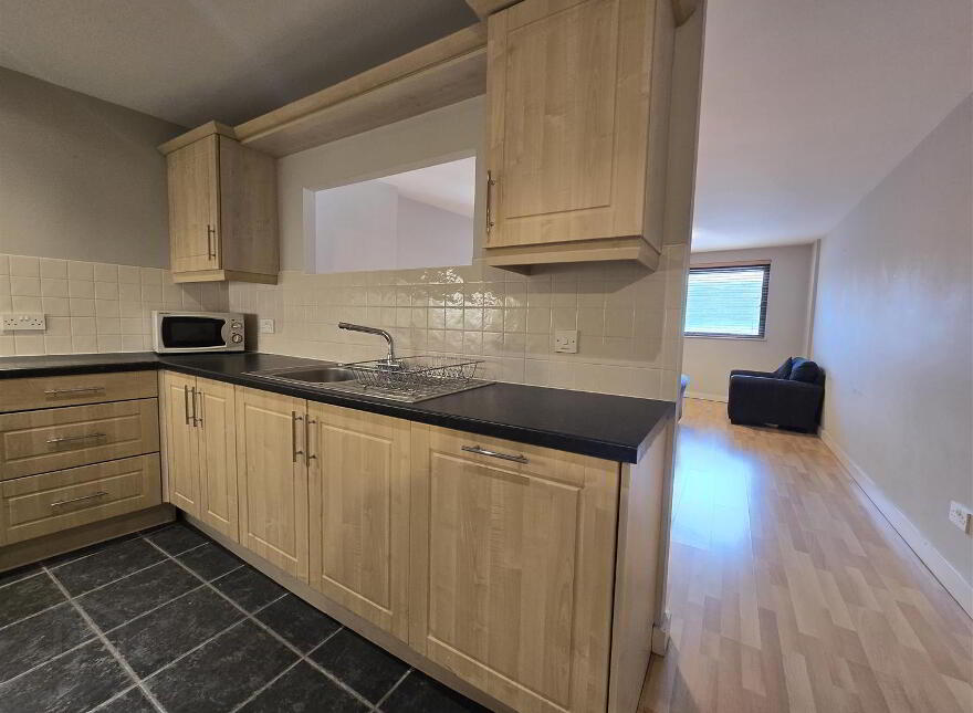 69 Queens Square, Belfast, BT1 3FF