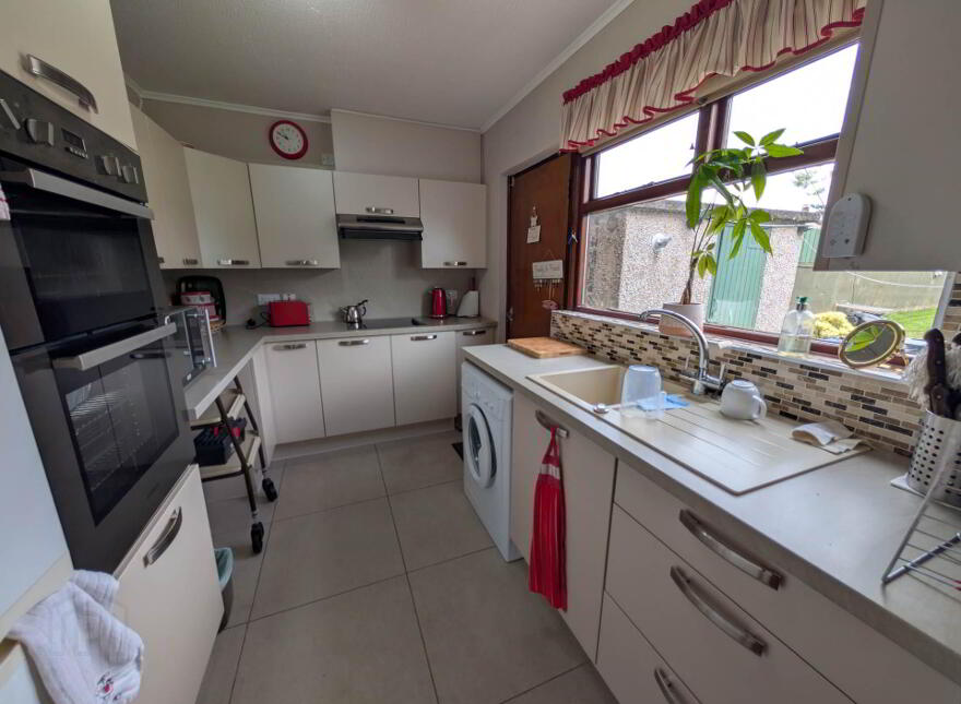 43 Killyglen Road, Larne, BT40 2HT