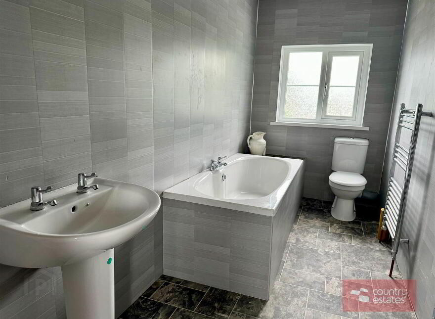 70 Carnalbanagh Road, Glenarm, Ballymena, BT44 0BS