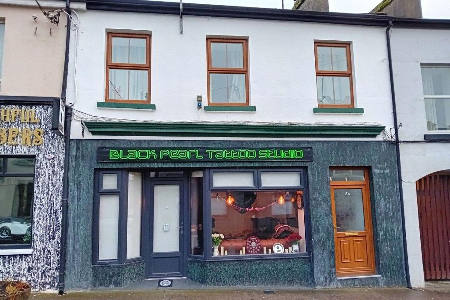 Black Pearl Tattoo Studio 2 of 12